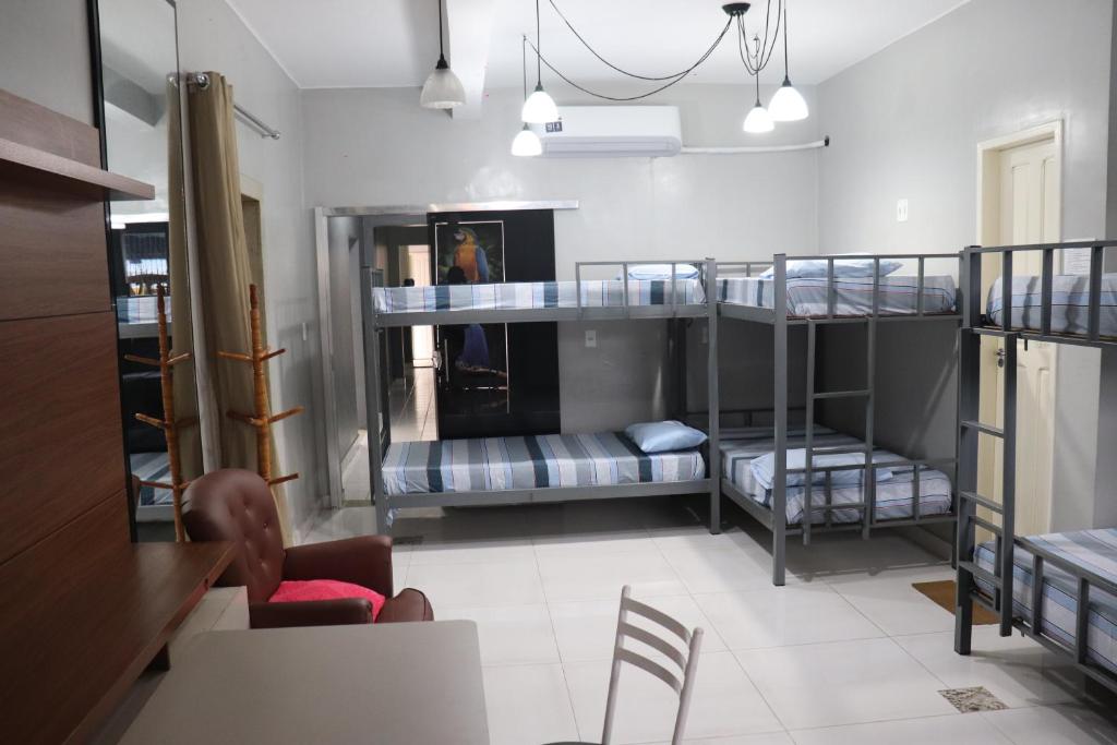 Postel nebo postele na pokoji v ubytování Aldeia Hostel II