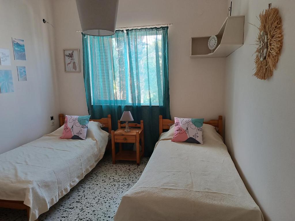 Postel nebo postele na pokoji v ubytování ARMIRA HOME