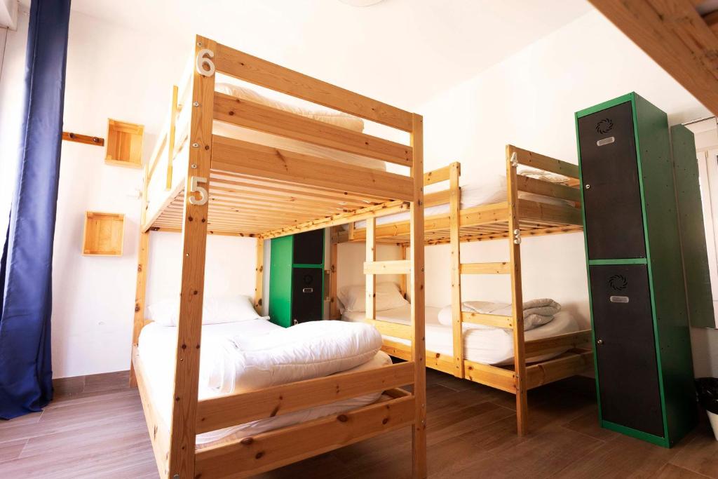 Postel nebo postele na pokoji v ubytování Green Hostel Oviedo