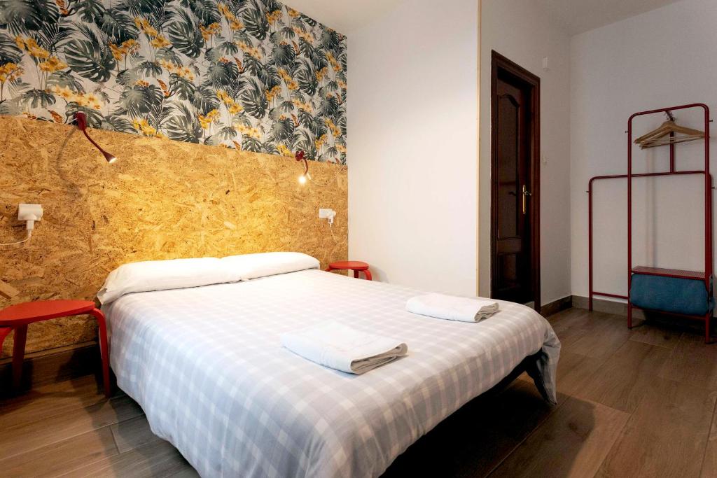 Postel nebo postele na pokoji v ubytování Green Hostel Oviedo