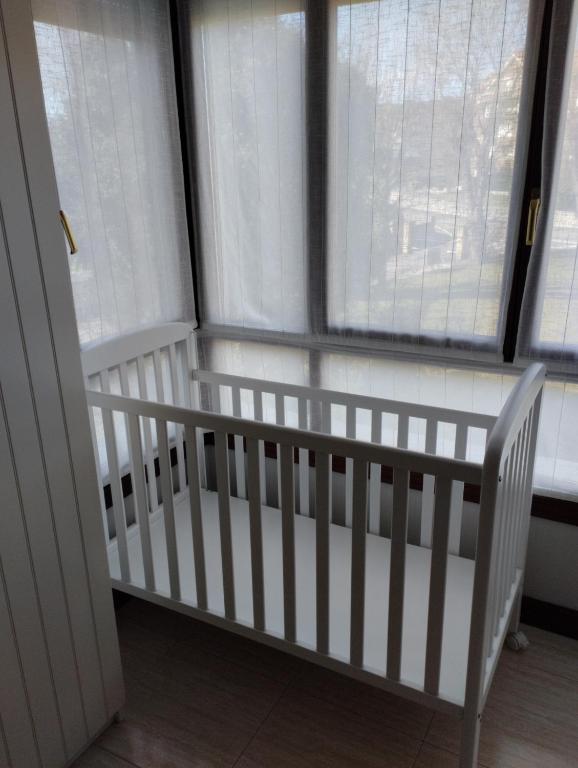 Postel nebo postele na pokoji v ubytování Apartamento Noja Beach