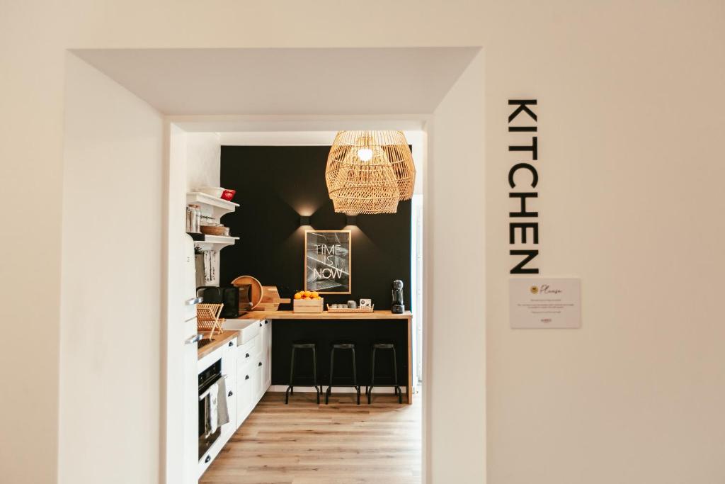 Kuchyň nebo kuchyňský kout v ubytování Aires Hostel