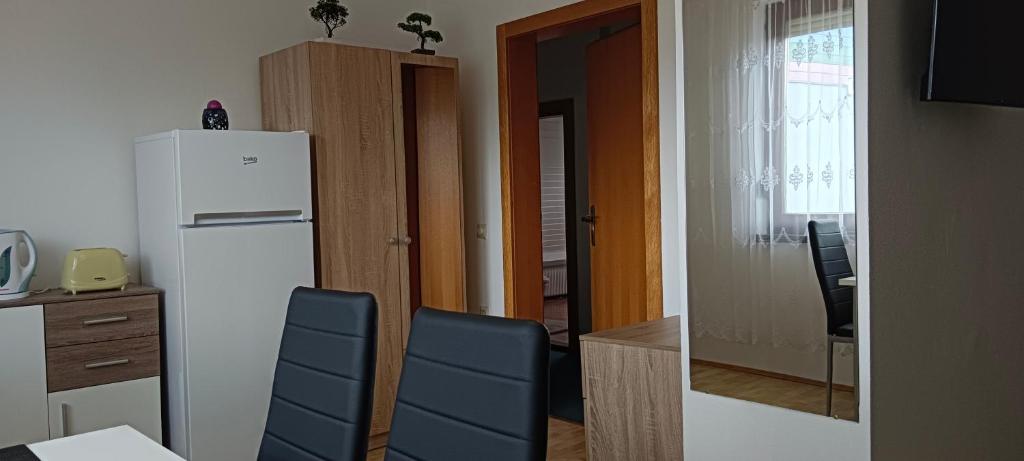 Kuchyň nebo kuchyňský kout v ubytování Ring Gästehaus