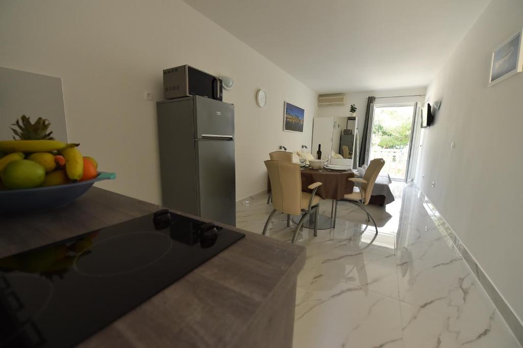 Kuchyň nebo kuchyňský kout v ubytování Beach Apartments Vlado