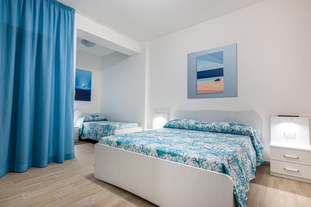 Katil atau katil-katil dalam bilik di Agio Apartments Diamante - Trilocale Superior