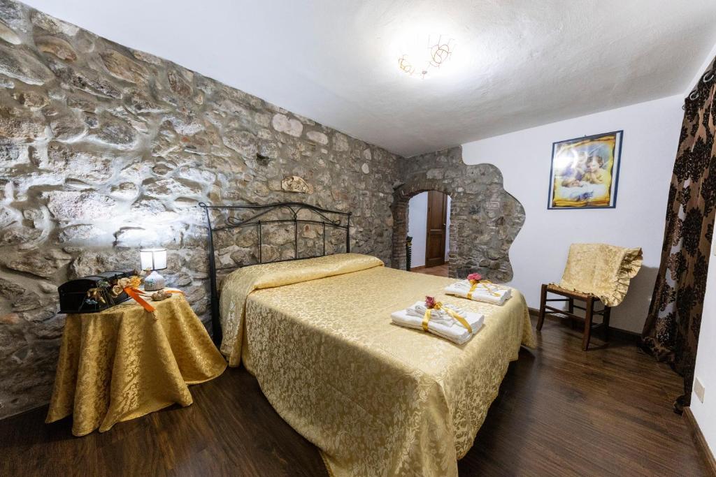 Ένα ή περισσότερα κρεβάτια σε δωμάτιο στο CarMa Apartment