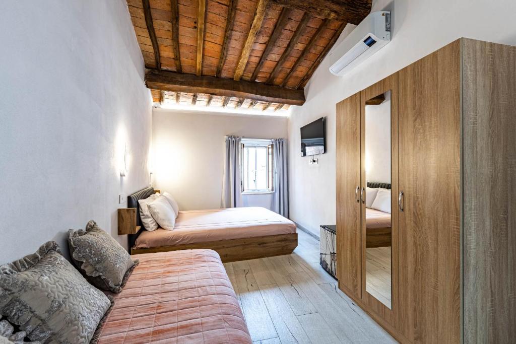 A bed or beds in a room at Room Rent Morrona