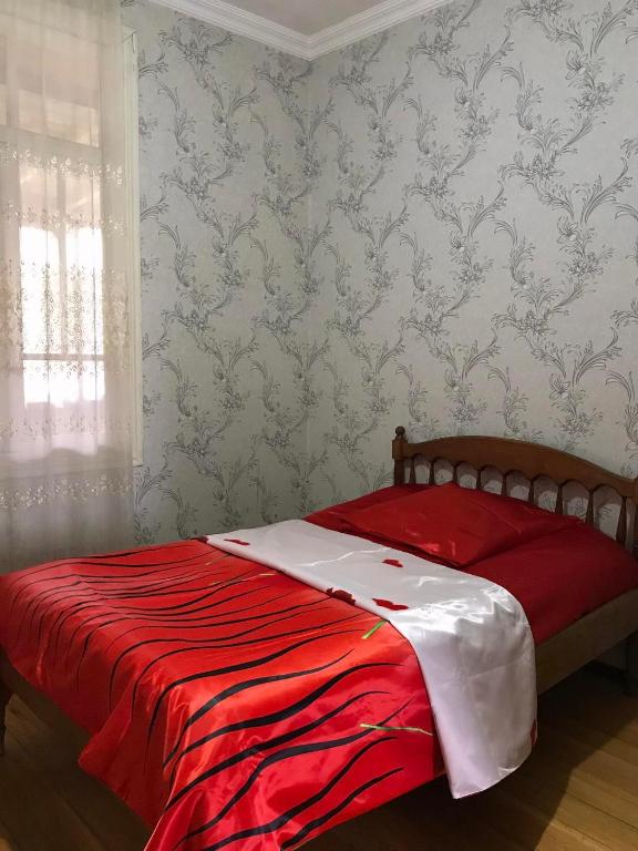 Postel nebo postele na pokoji v ubytování Guesthouse _ DAVITI