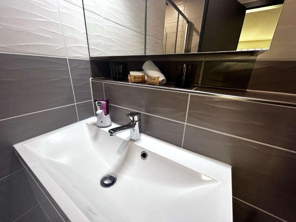 Koupelna v ubytování Hotel La Croix Blanche - Bassecourt