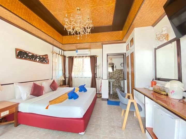 Postel nebo postele na pokoji v ubytování Koh Chang Resort
