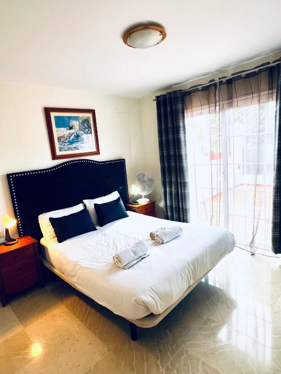Posteľ alebo postele v izbe v ubytovaní Cozy apartment in Palm-Mar 60 m² with shared pool