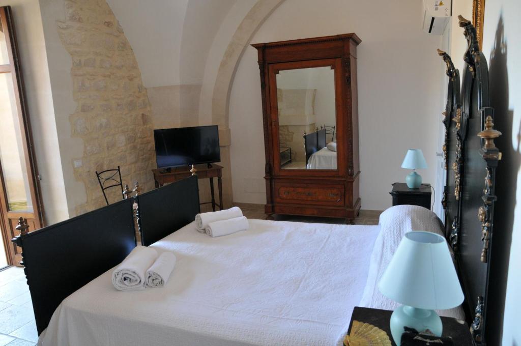 Postel nebo postele na pokoji v ubytování Casa Sipione Papa