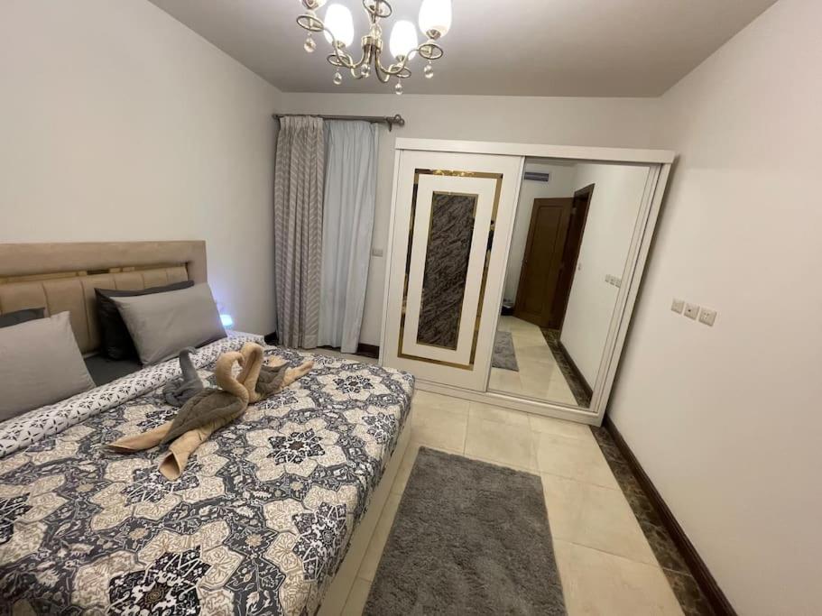 Postel nebo postele na pokoji v ubytování Brand new duplex in Porto Cairo