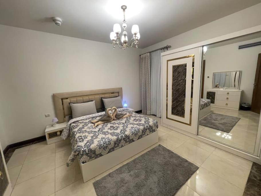 Postel nebo postele na pokoji v ubytování Brand new duplex in Porto Cairo