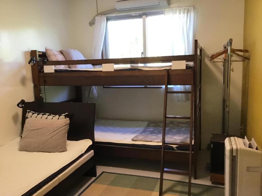 Ein Etagenbett oder Etagenbetten in einem Zimmer der Unterkunft Shimaotoya - Vacation STAY 39955v