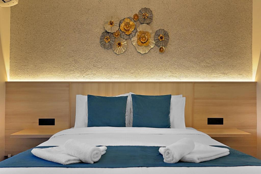 Postel nebo postele na pokoji v ubytování AMMOESSA APARTMENTS