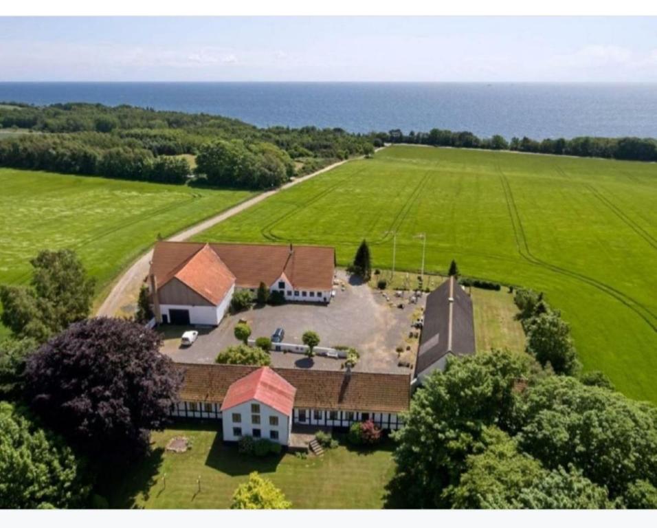 an aerial view of a large house in a field at Hyttan in Åkirkeby