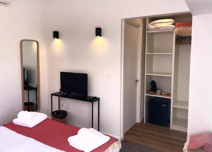 Postel nebo postele na pokoji v ubytování Aires Hostel