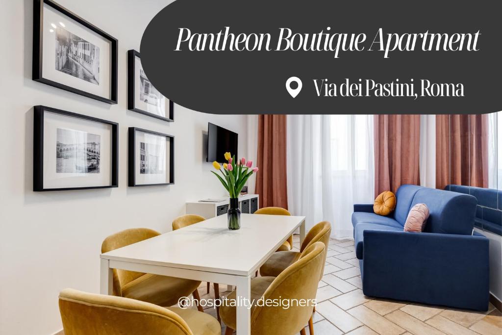 a living room with a white table and a blue couch at Pantheon Boutique Apartment "La Dolce Vita" in Rome