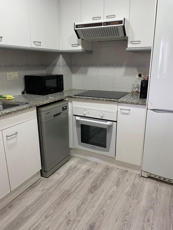 A kitchen or kitchenette at Vitaly Beach