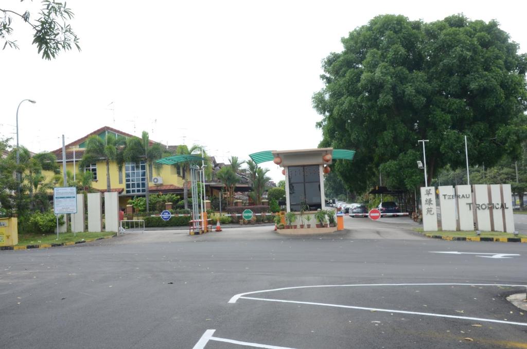 an empty parking lot with a gas station at Jiaxin Homestay - Desa Terbau 家馨民宿 in Johor Bahru