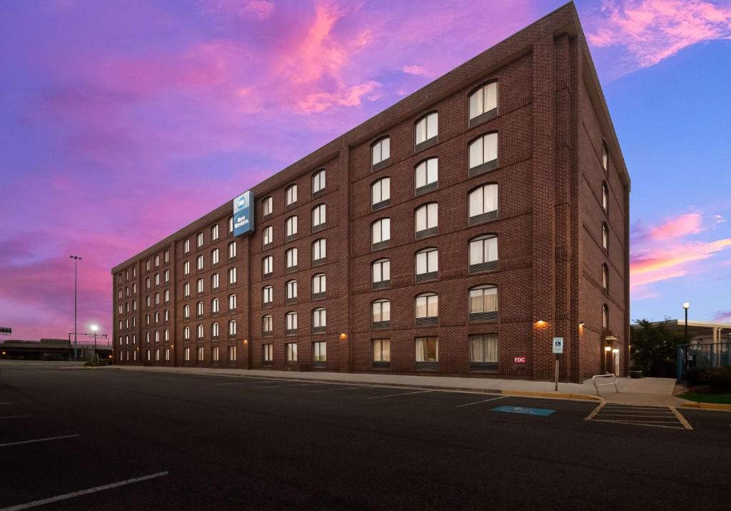 a large brick building on the side of a street at Best Western Springfield in Springfield