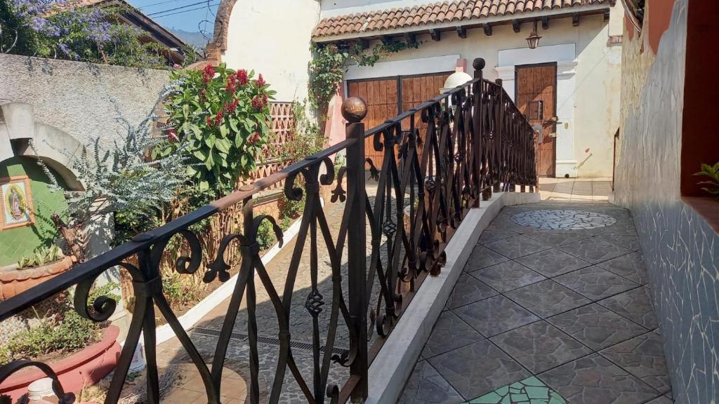 a wrought iron fence in front of a house at Casa Gabriel in Antigua Guatemala