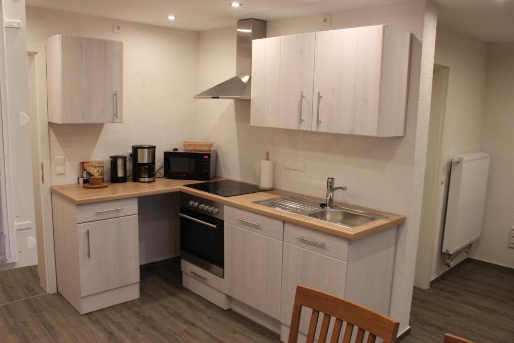 Kuchyň nebo kuchyňský kout v ubytování Ferienhaus Kunz