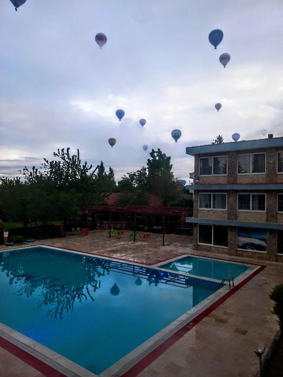 Bazén v ubytování Uyum Hotel nebo v jeho okolí