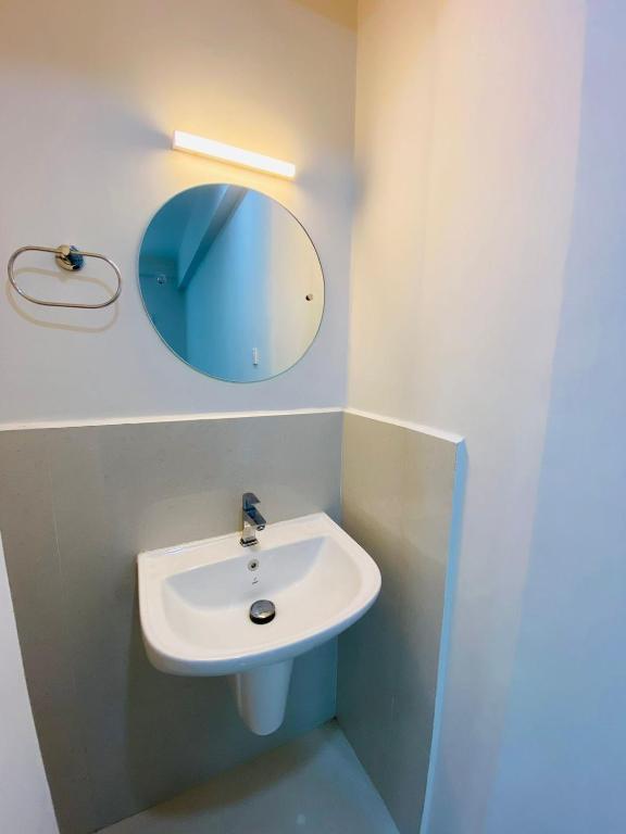 Koupelna v ubytování Nujoom Apartments