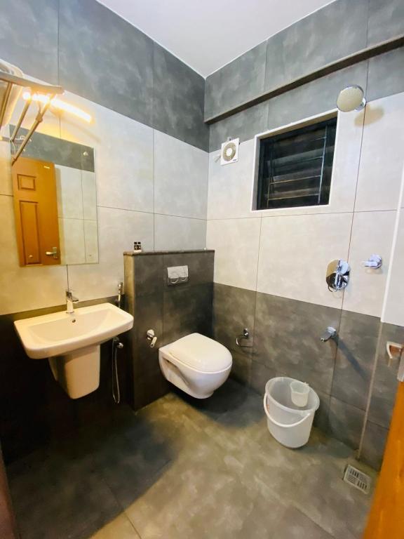 Koupelna v ubytování Nujoom Apartments