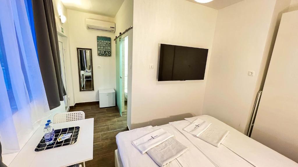 Postel nebo postele na pokoji v ubytování Rooms Koblar