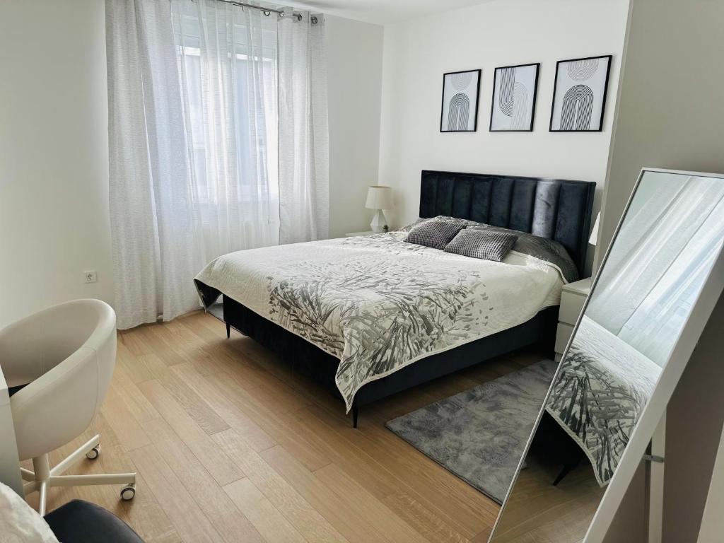 Ένα ή περισσότερα κρεβάτια σε δωμάτιο στο Le Boutique Chambre Vita