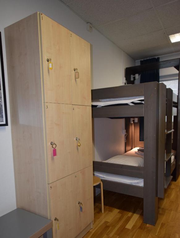 Postel nebo postele na pokoji v ubytování Hostel Snoozemore