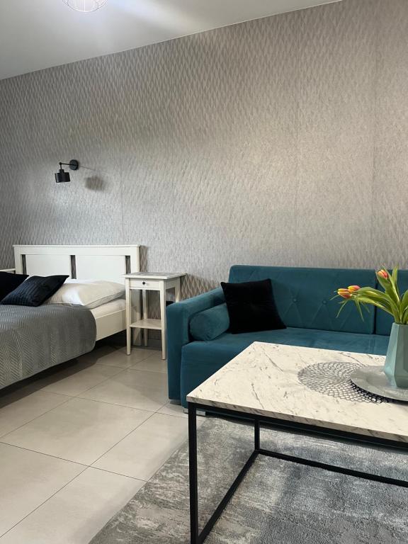 Posteľ alebo postele v izbe v ubytovaní Apartamenty na Blichu - Noclegi Energylandia Zator