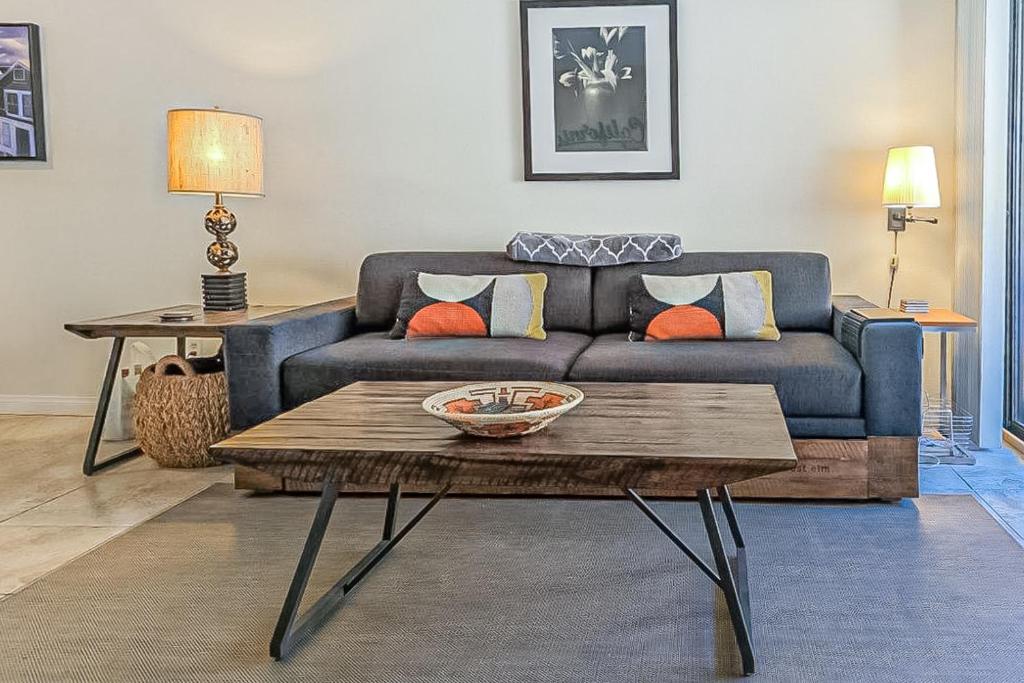 a living room with a couch and a coffee table at Mountains & Palms #5648 in Palm Springs