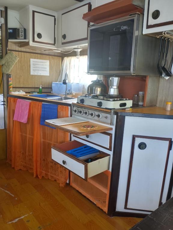 Kuchyň nebo kuchyňský kout v ubytování Backpack Cabin A 49149