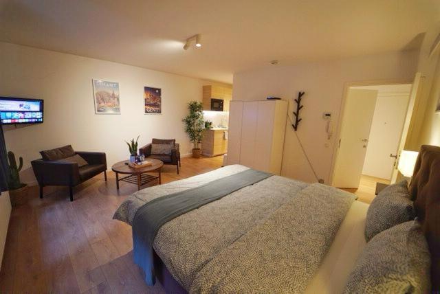 Postel nebo postele na pokoji v ubytování Arku apartments Brussels Airport