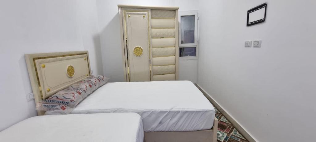 Postel nebo postele na pokoji v ubytování Sandbeach apartment