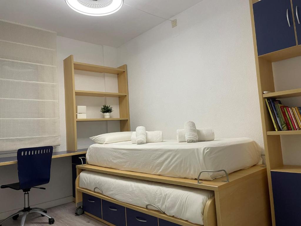 A bed or beds in a room at Vitaly Beach