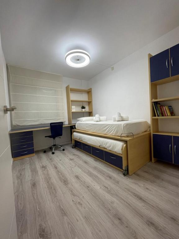 A bed or beds in a room at Vitaly Beach
