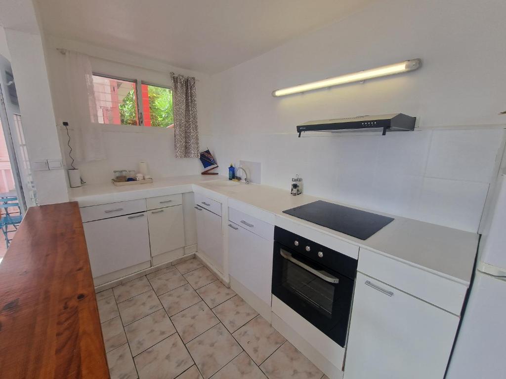 Kuchyň nebo kuchyňský kout v ubytování Habitation Bellevue