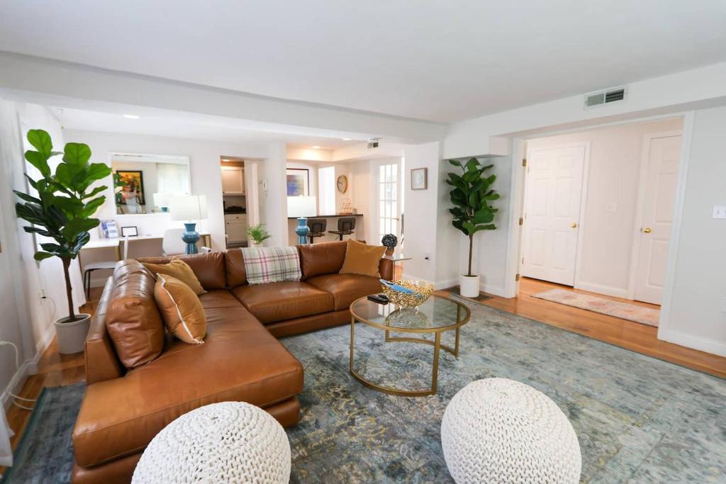 a living room with a couch and a table at Single Family,3 Bed, 3 Bath,harvard, Mit,hospitals in Cambridge