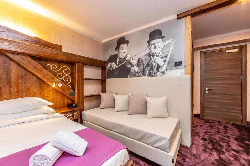 Postel nebo postele na pokoji v ubytování Garden Wellness Hotel S