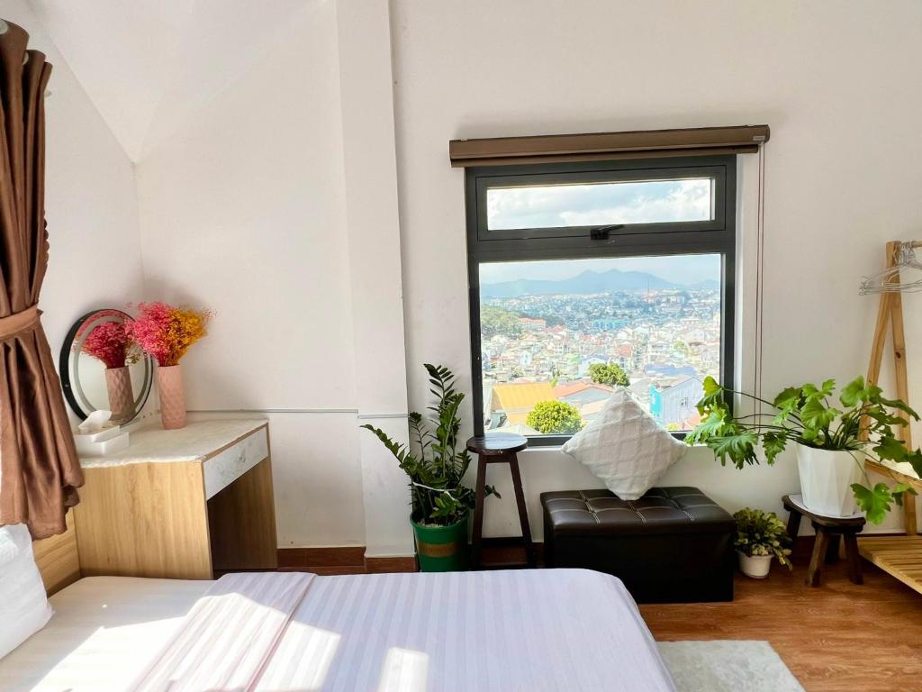 Postel nebo postele na pokoji v ubytování Nhà An Đà Lạt 2