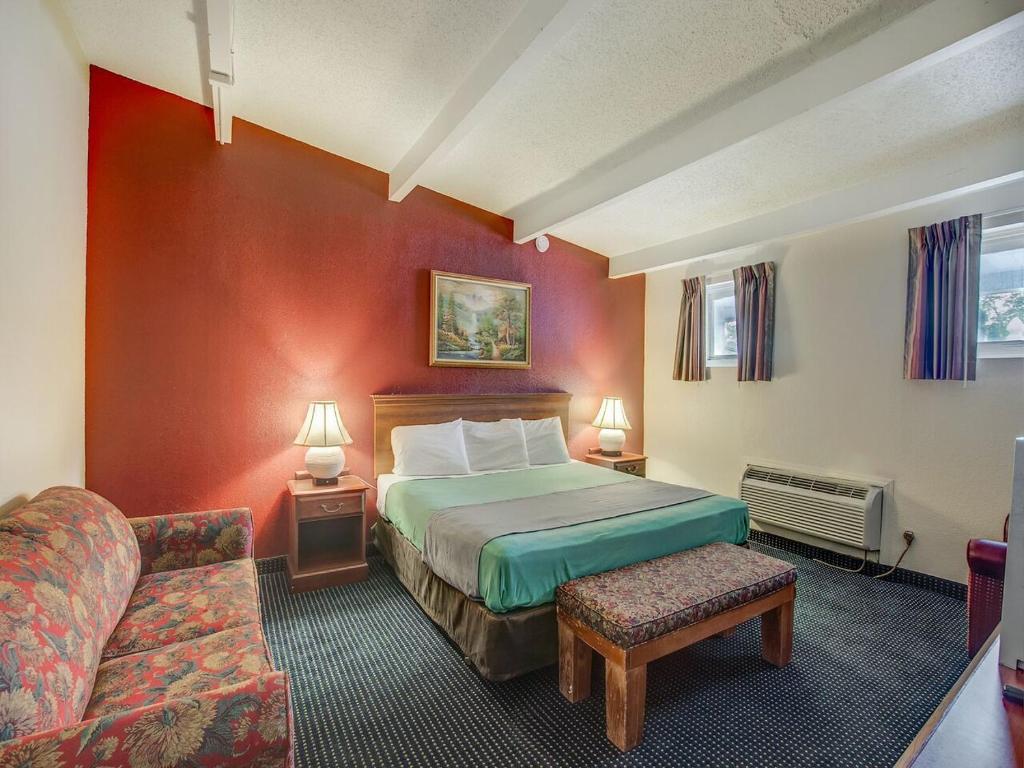 Postel nebo postele na pokoji v ubytování Scottish Inn Whippany