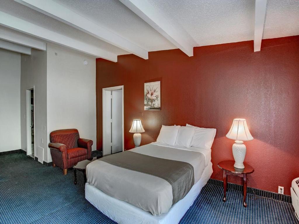 Postel nebo postele na pokoji v ubytování Scottish Inn Whippany
