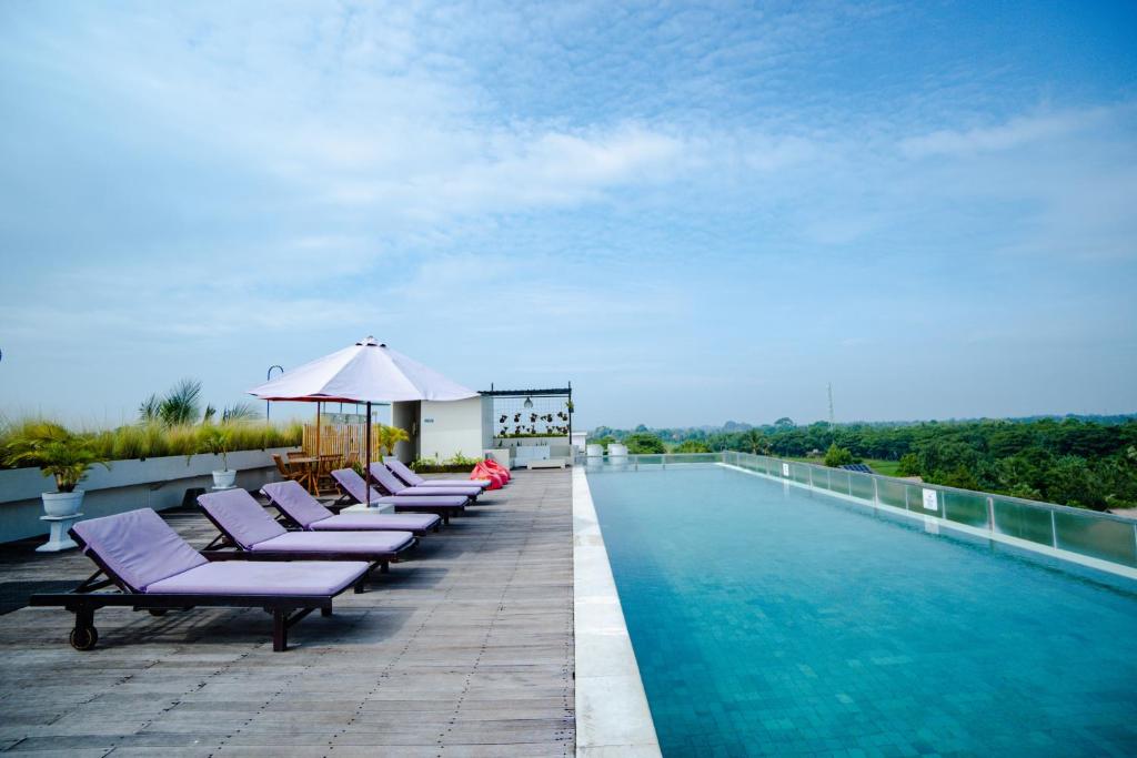 Bazén v ubytování The Evitel Resort Ubud nebo v jeho okolí