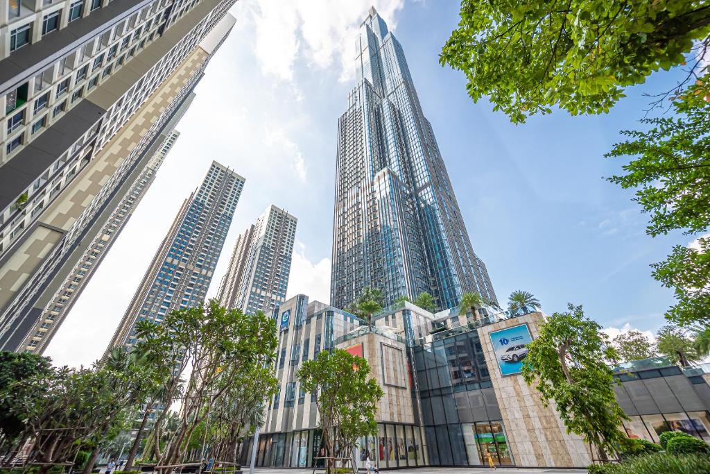 a view of a city with tall buildings at Landmark 81 and Vinhomes Riverside Residence in Ho Chi Minh City