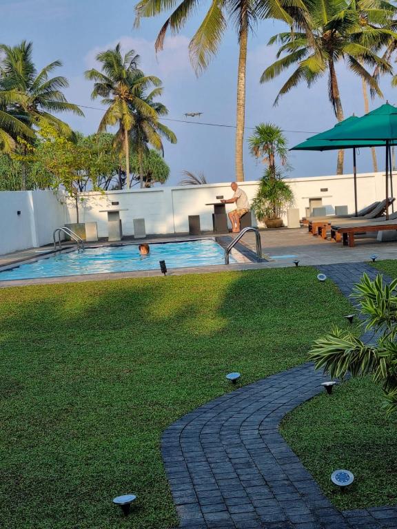 Bazén v ubytování Darshana Beach Hotel nebo v jeho okolí